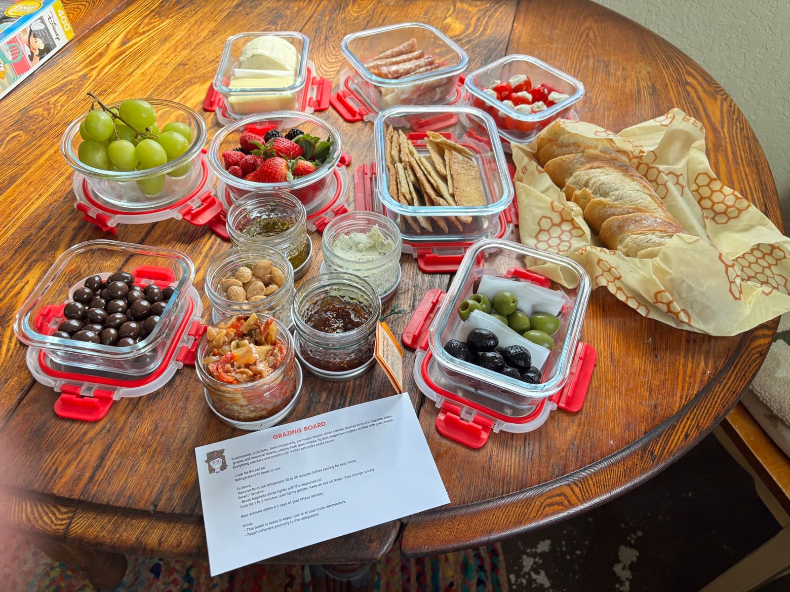 Spring grazing board with cheeses, meats, and fresh produce
