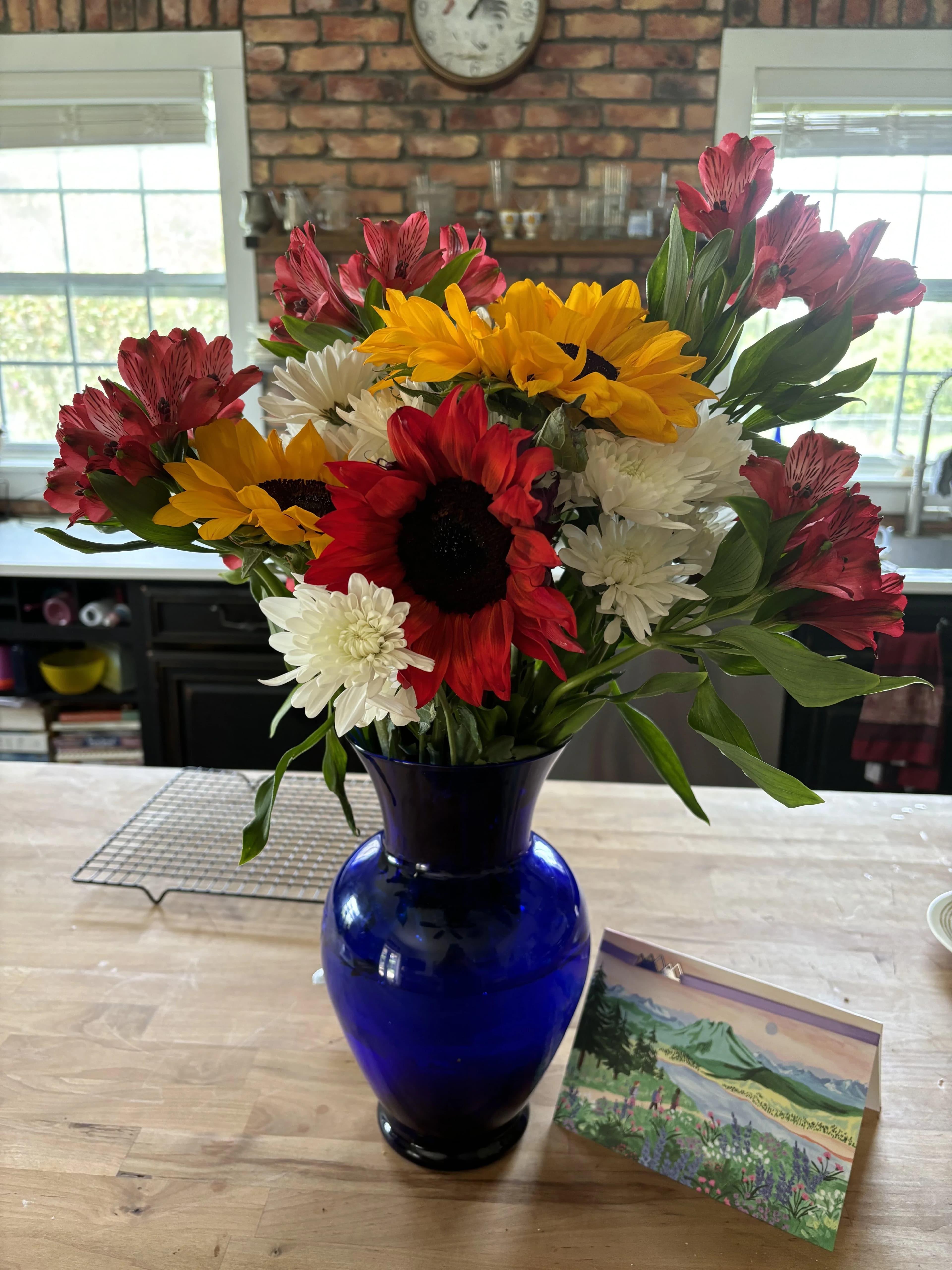 Colorful flower arrangement in blue vase